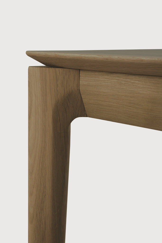 Natural Teak Bok Bench detail with white background and beautiful wood joinery. - Saffron and Poe, Ethnicraft