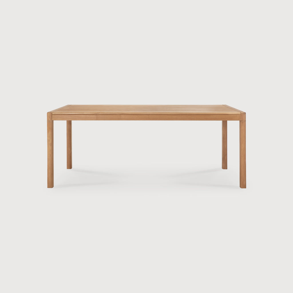 Teak Jack Outdoor Dining Table side view with white background and beautiful wood joinery. - Saffron and Poe, Ethnicraft