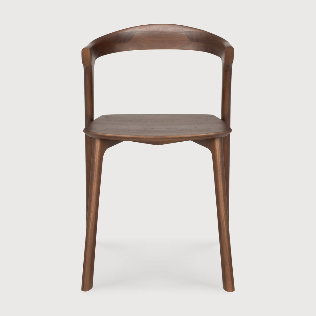 Dark Teak Bok Dining Chair front view with white background and beautiful wood joinery. - Saffron and Poe, Ethnicraft
