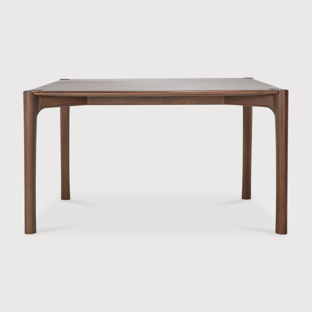 Small Dark Teak PI Dining Table front angle with white background and beautiful wood joinery. - Saffron and Poe, Ethnicraft