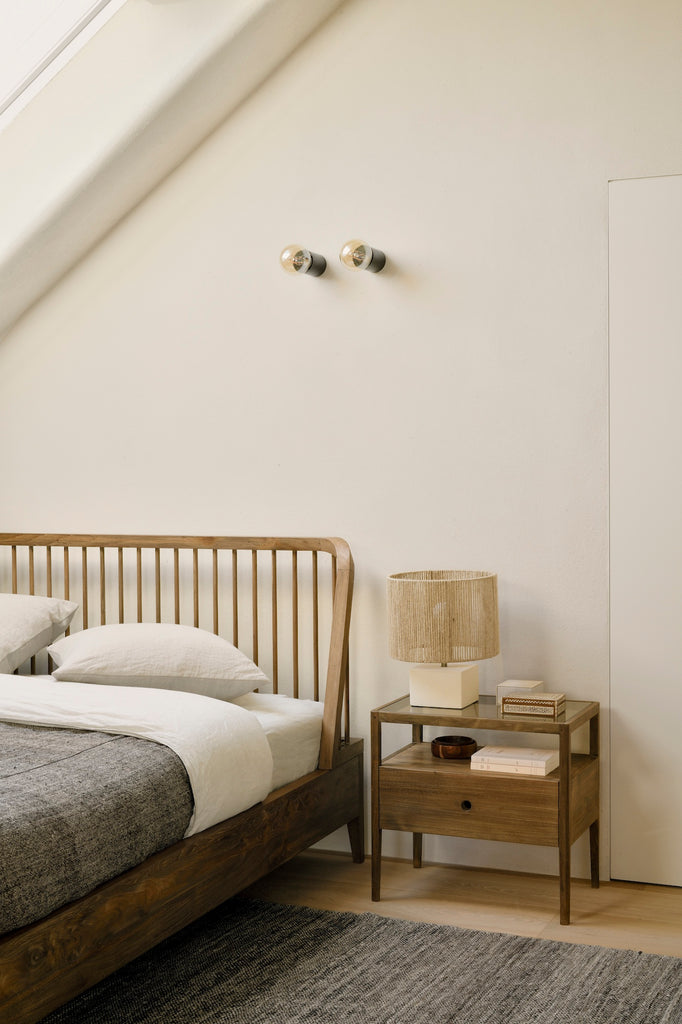 Rounded wood headboard of reclaimed solid teak bed frame with beautiful wood spindle details - detail shot -Saffron and Poe, Ethnicraft