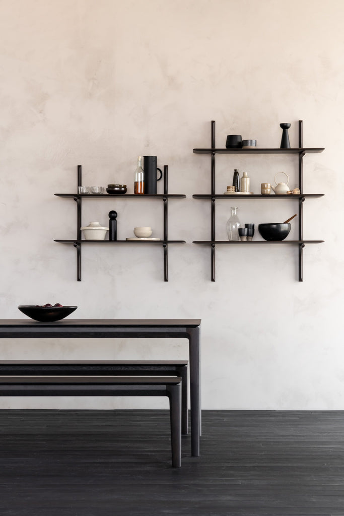 Black Oak Bok Benches and Bok dining table in plastered Modern European inspired dining room with styled Pi Shelves. - Saffron and Poe, Ethnicraft