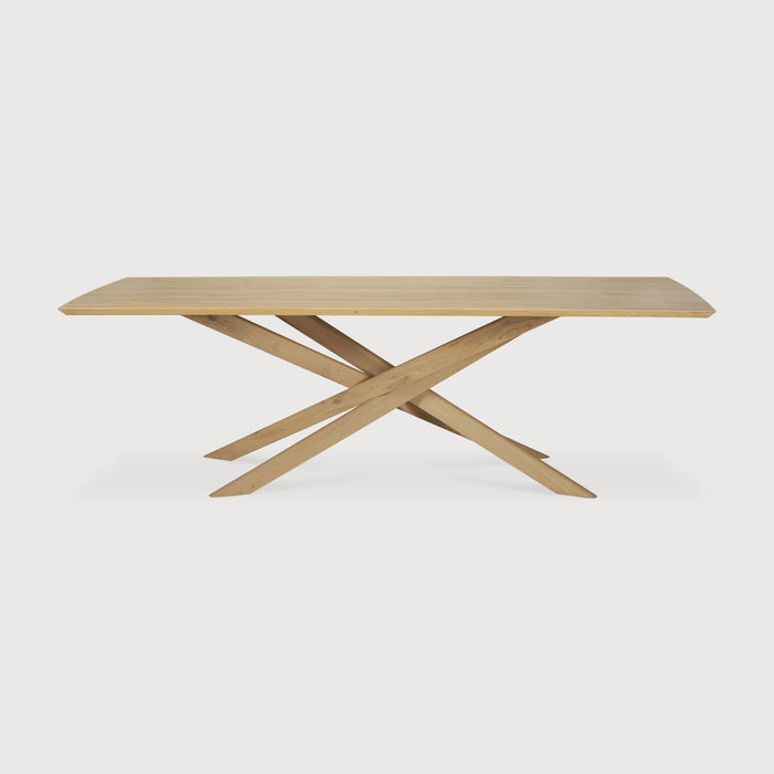 White Oak Rectangle Mikado Dining Table front view with white background and beautiful intersecting wood legs. - Saffron and Poe, Ethnicraft