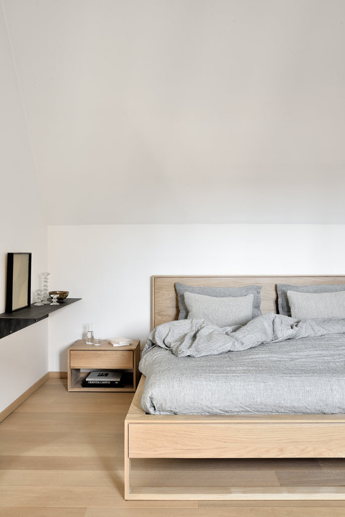 White oak bedside table with one drawer combines elegant lines with the purity of solid wood with beautiful dovetail details - pictured with bed from same Copenhagen collection - Saffron and Poe, Ethnicraft