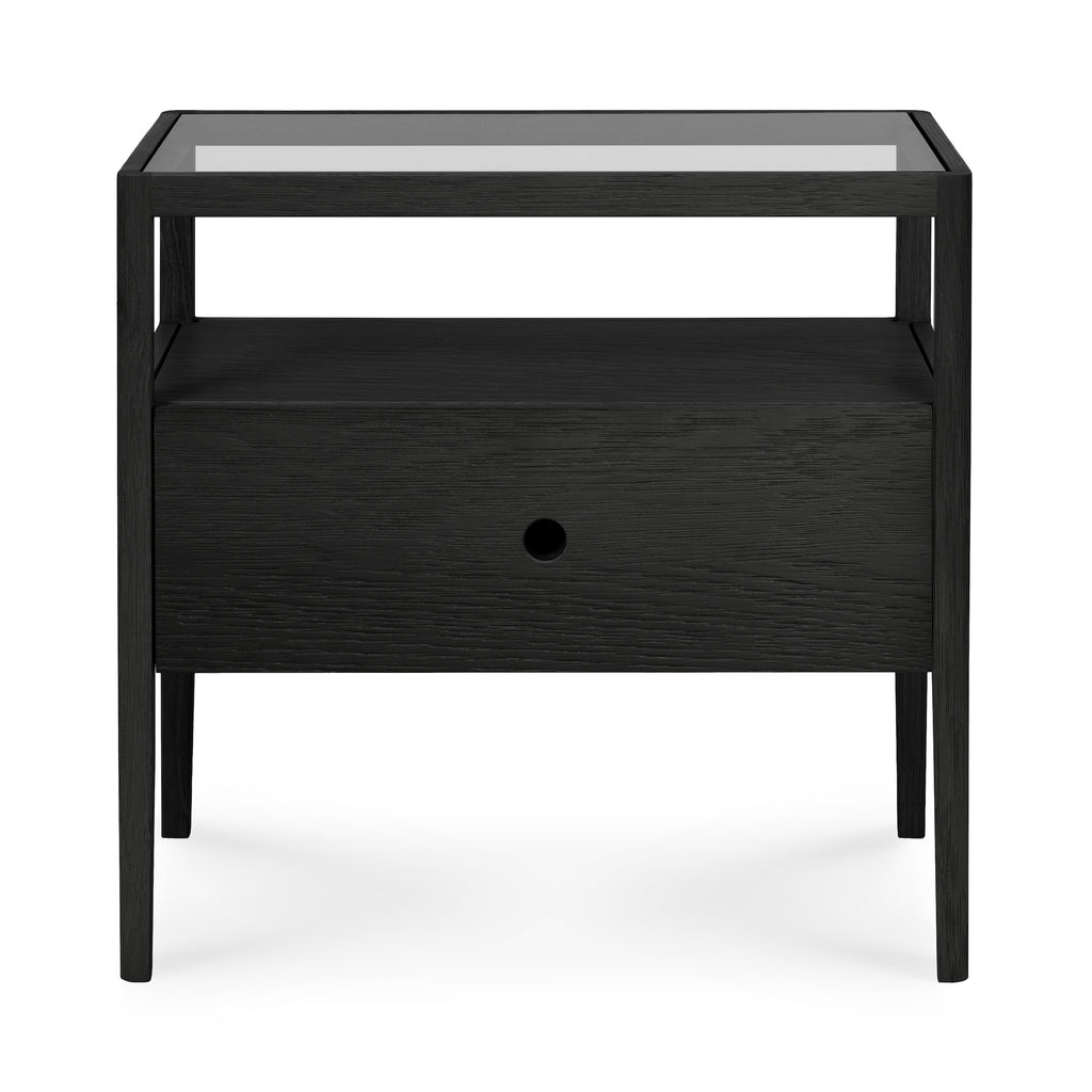 Solid blackened oak bedside table with one drawer, glass top and slightly tapered legs with beautiful wood joinery - front View - Saffron and Poe, Ethnicraft