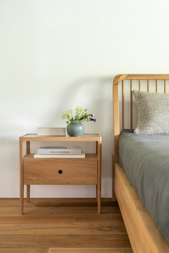 White Oak Spindle Bed detail view vignette in bedroom with Spindle bedside table. - Saffron and Poe, Ethnicraft