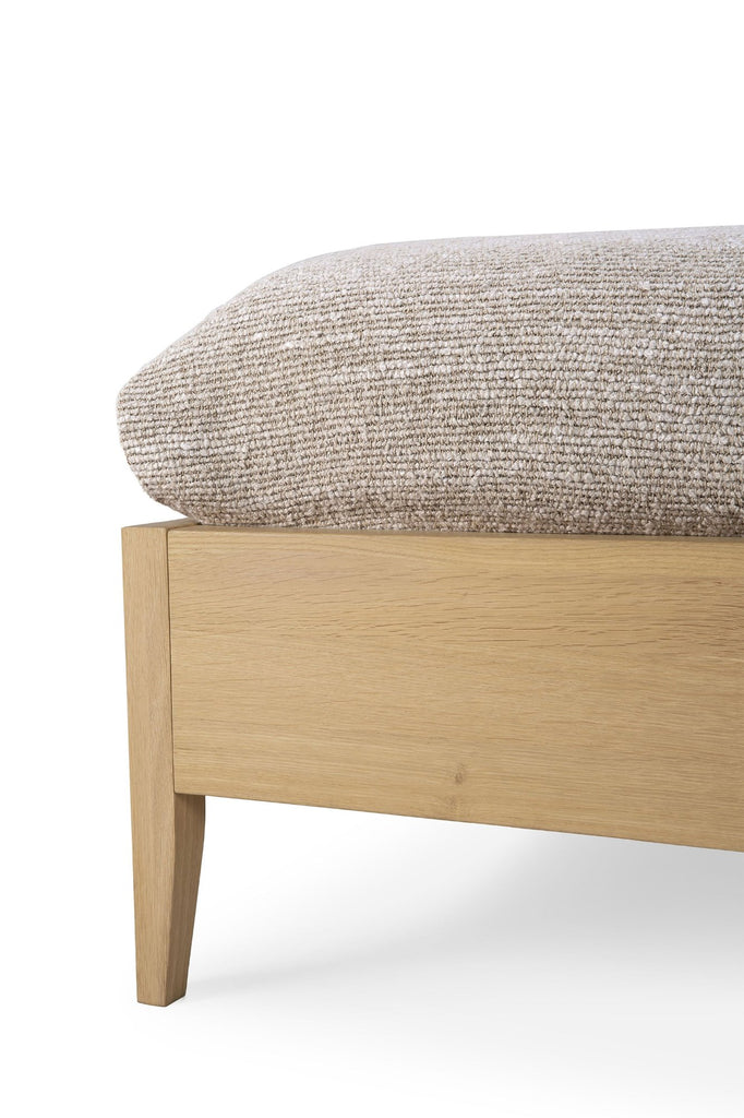 White Oak Spindle Bed footboard detail view with white background and beautiful wood detailing. - Saffron and Poe, Ethnicraft