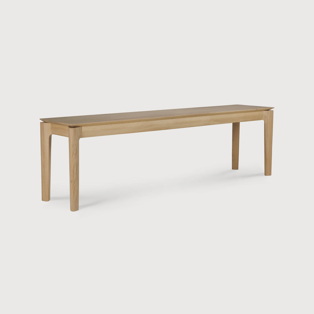 White Oak Bok Bench side angle view with white background and beautiful wood joinery. - Saffron and Poe, Ethnicraft