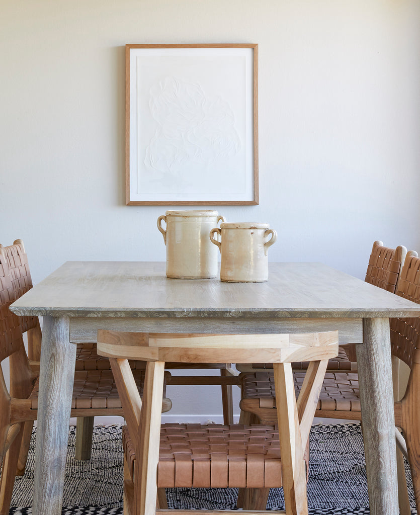 Italian Confit Pot Styled on dining table with woven leather dining chairs. - Saffron and Poe