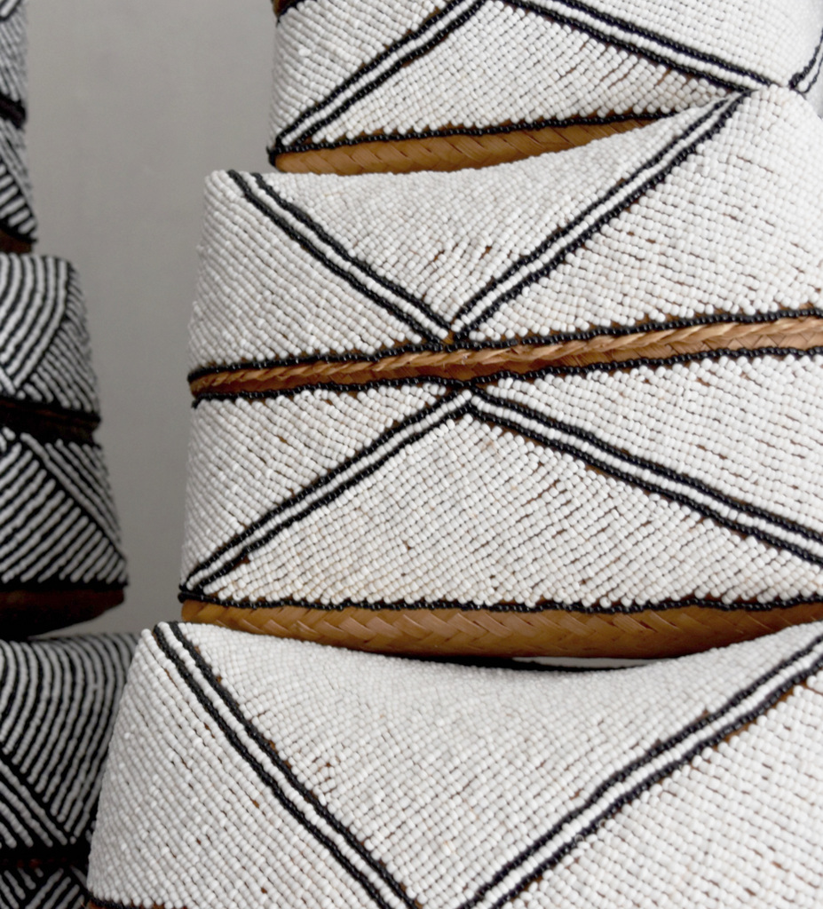Detailed view of Hand-Beaded Bali Storage Baskets white with black diamond outline up close. Handmade in Bali using seed beads and woven bamboo- Saffron and Poe