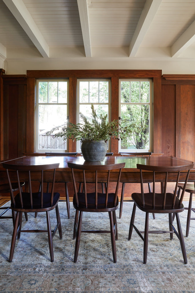 Antique Clay Pot styled in a dining room setting. - Saffron and Poe