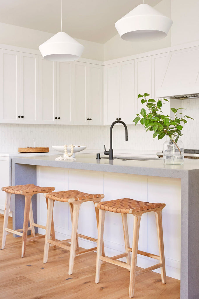 Backless Woven Leather Counter Stools for a kitchen island. - Saffron and Poe