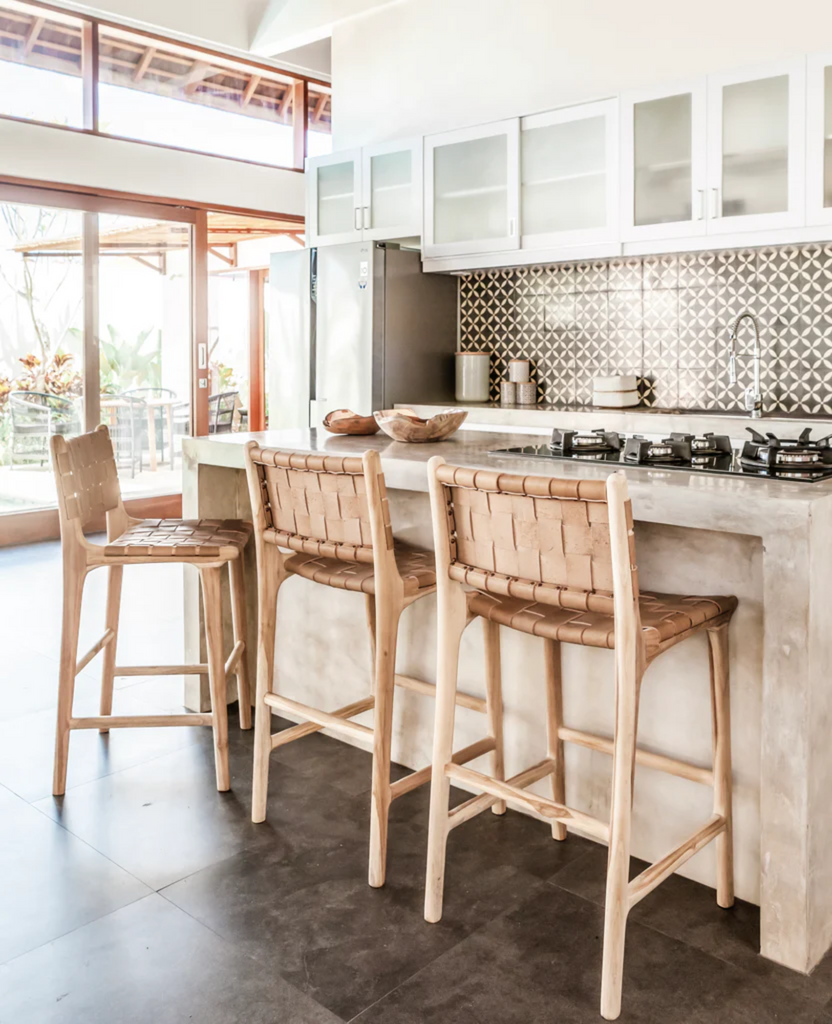 leather and wood counter chairs from bali