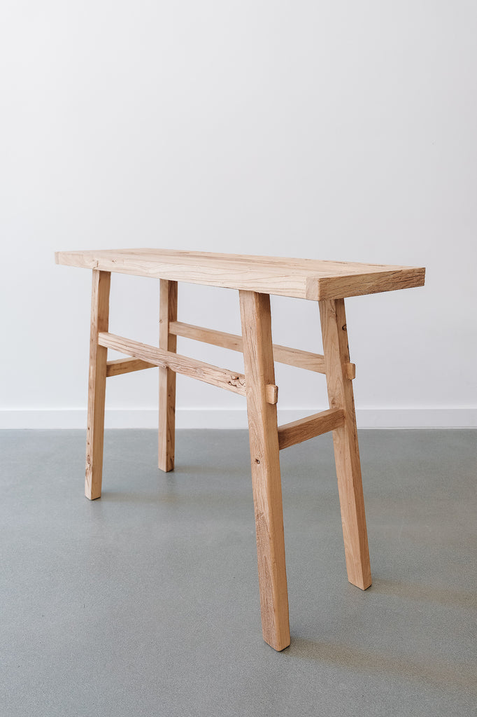 Angled view of Vintage Elmwood Console against a white background. - Saffron and Poe