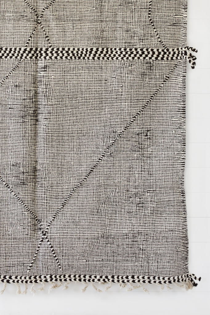 Close up view of No. 31 - Moroccan Flat Weave Kilim Rug against a white background. - Saffron and Poe