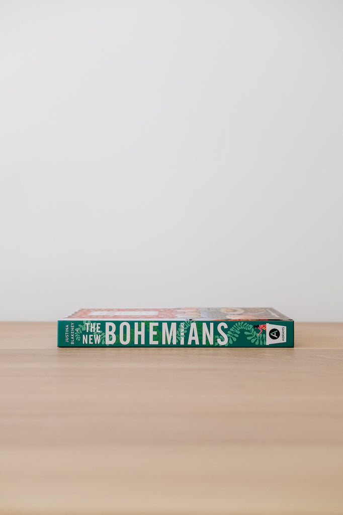 Side view of The New Bohemians against a white wall - Saffron and Poe
