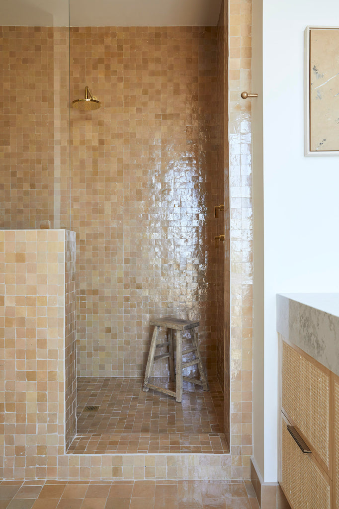 Styled Antique Chinese Stool in a full tile bathroom. - Saffron and Poe