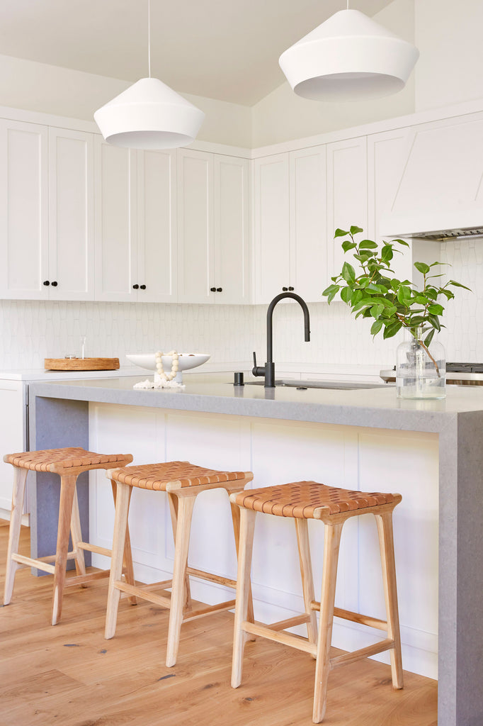 Backless Woven Leather Counter Stools for a kitchen island. - Saffron and Poe