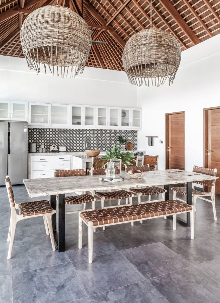 Teak framed Woven Leather Strap Bench styled at kitchen table for extra seating at table. Furniture Handcrafted in Bali.- Saffron and Poe