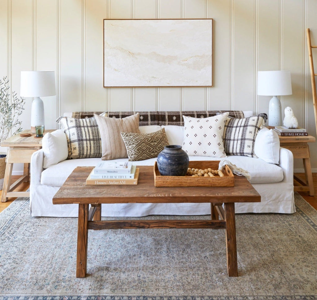 elmwood coffee table in a neutral colored living room setting