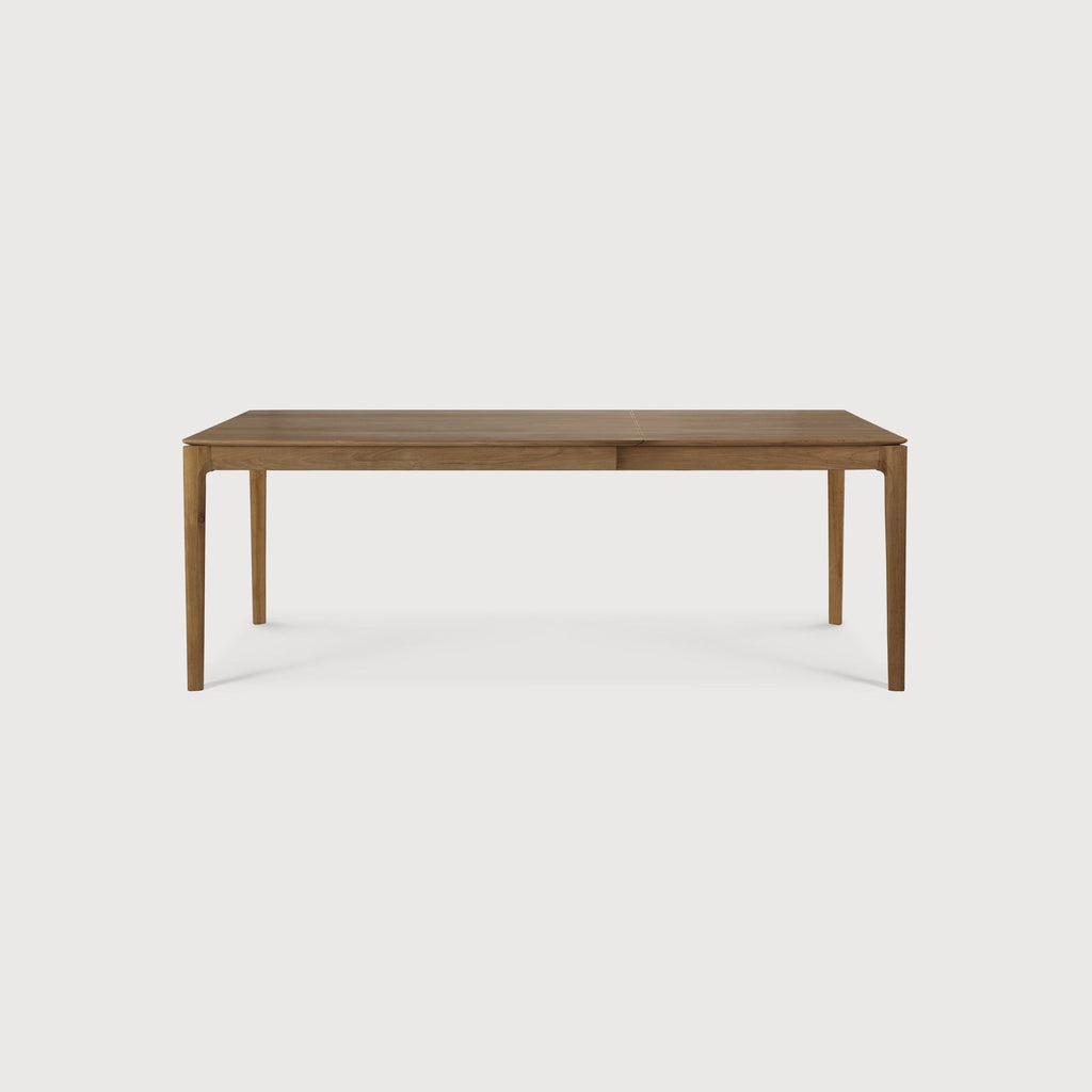 Bok Extendable Dining Table in natural teak with contoured frame and floating tabletop