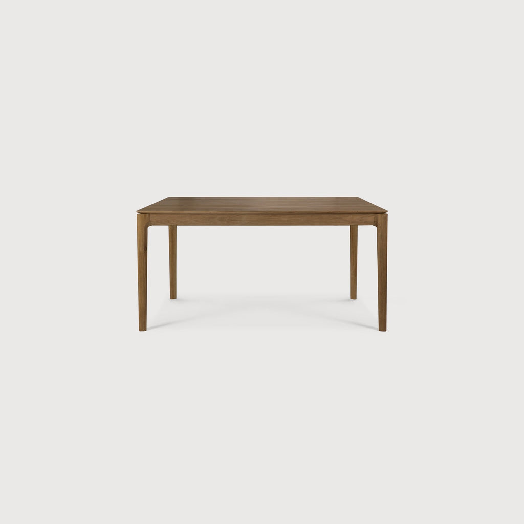 Bok Extendable Dining Table in natural teak with contoured frame and floating top