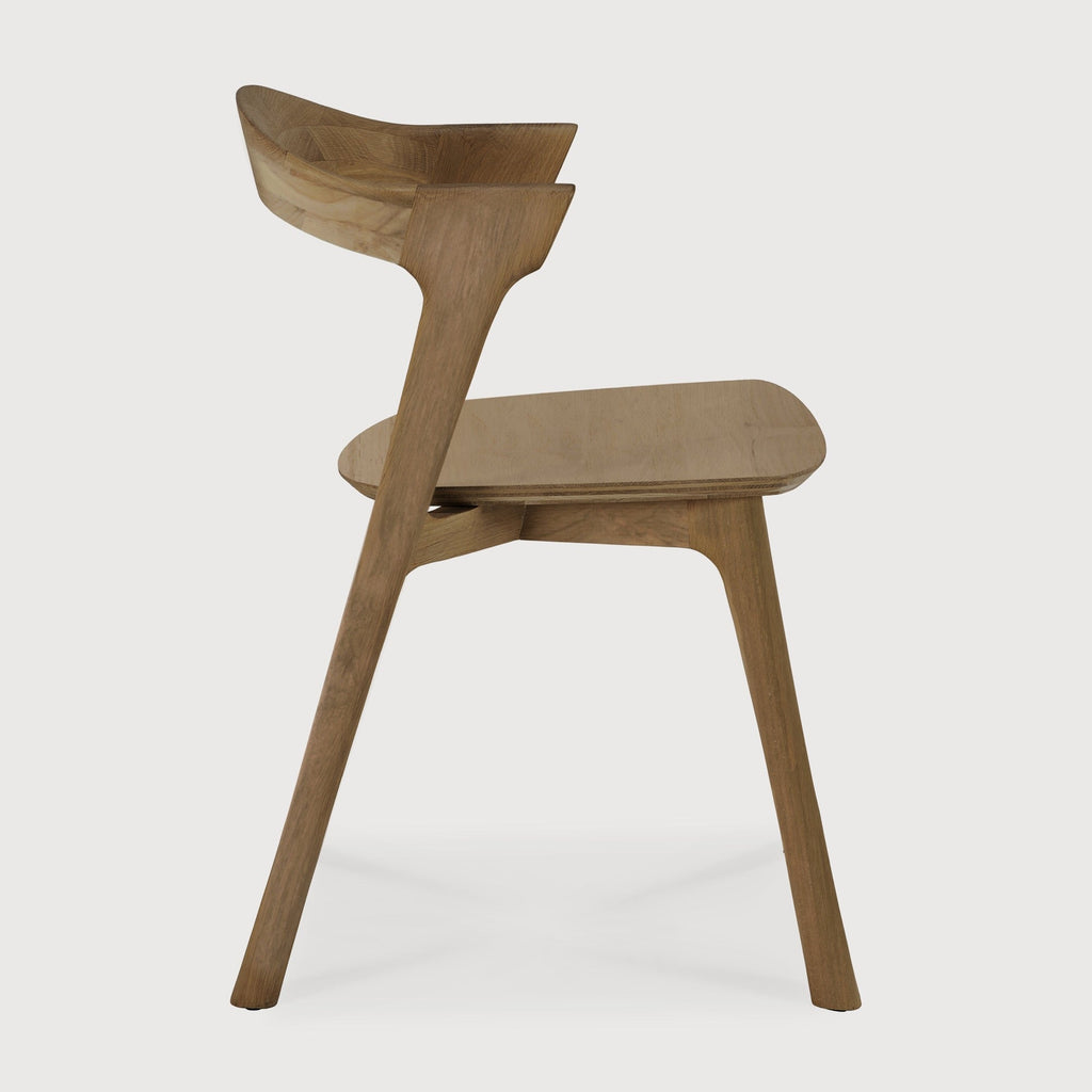 Bok Dining Chair made of natural teak with contoured frame and clean lines
