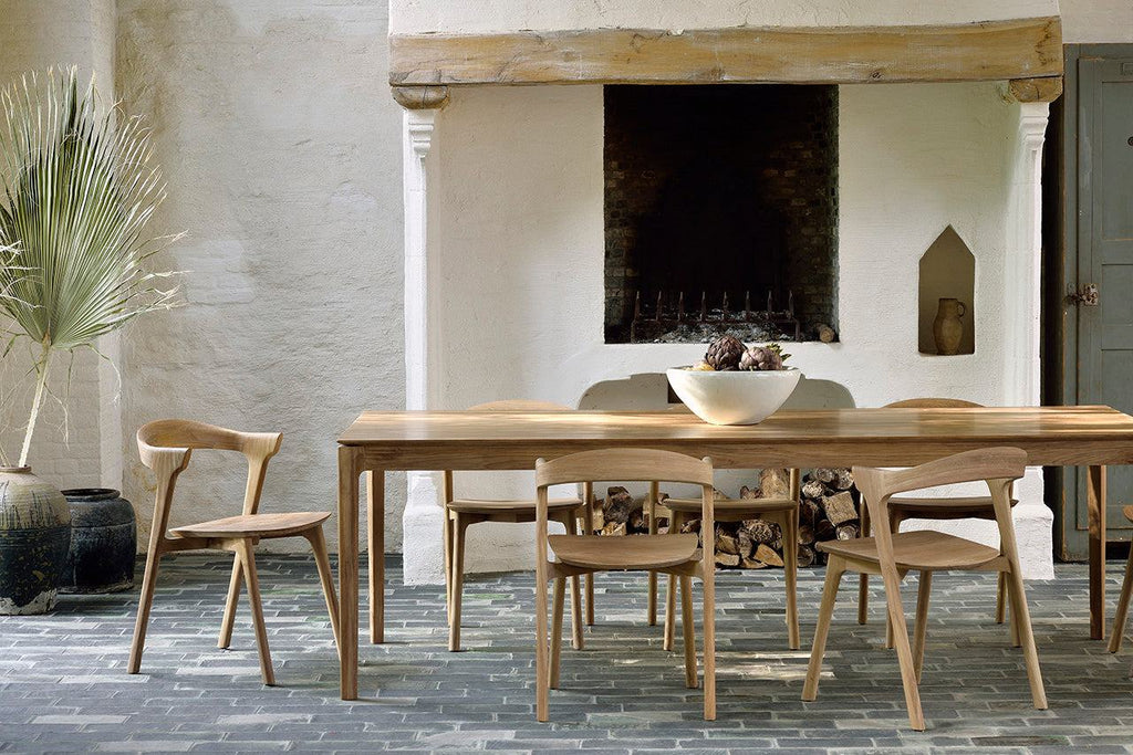 Bok Extendable Dining Table in natural teak with contoured frame and floating top