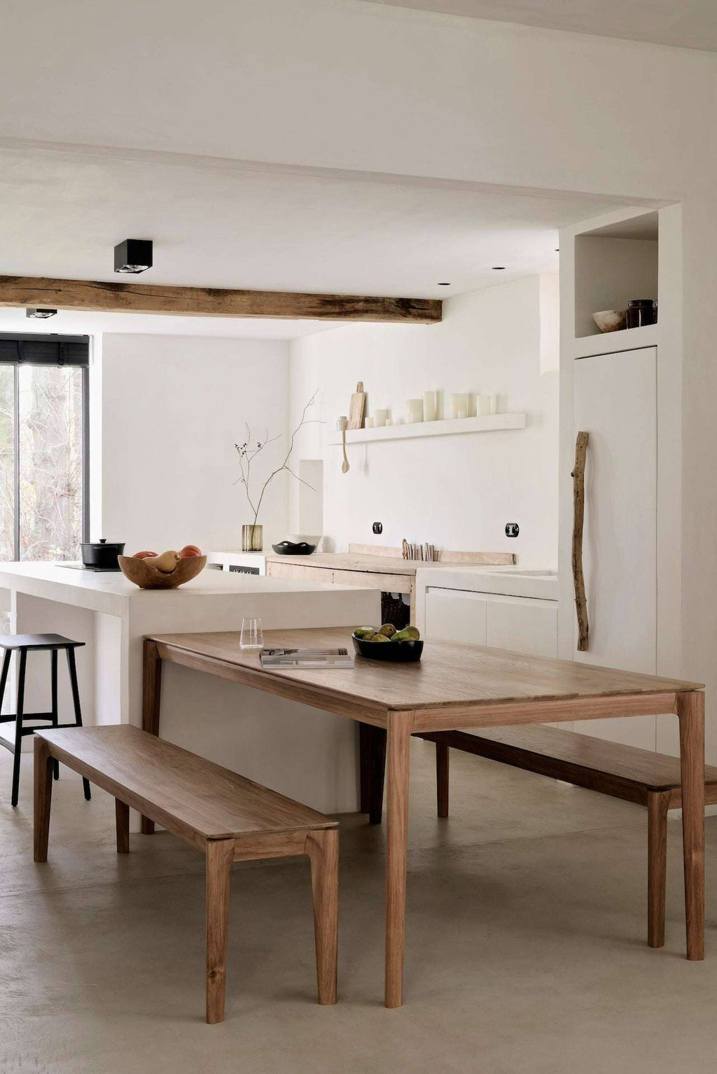 Bok Extendable Dining Table made of natural teak with contoured frame and floating top