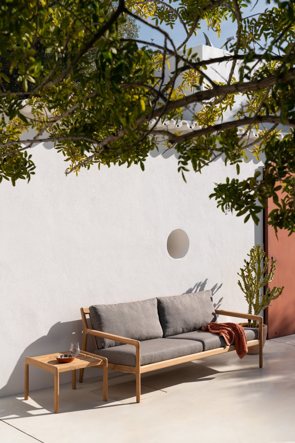 Jack Outdoor Side Table solid teak with organic elegant design for outdoor use