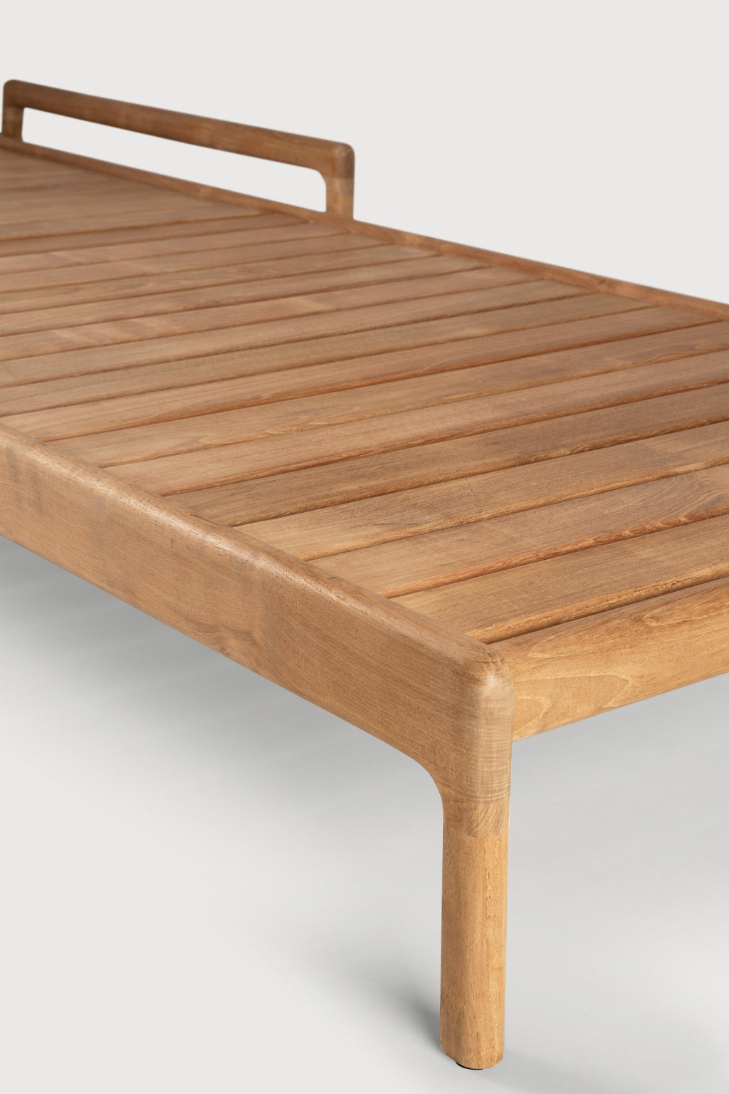 Jack Outdoor Adjustable Lounger in solid teak with red Belgium fabric cushion outdoors