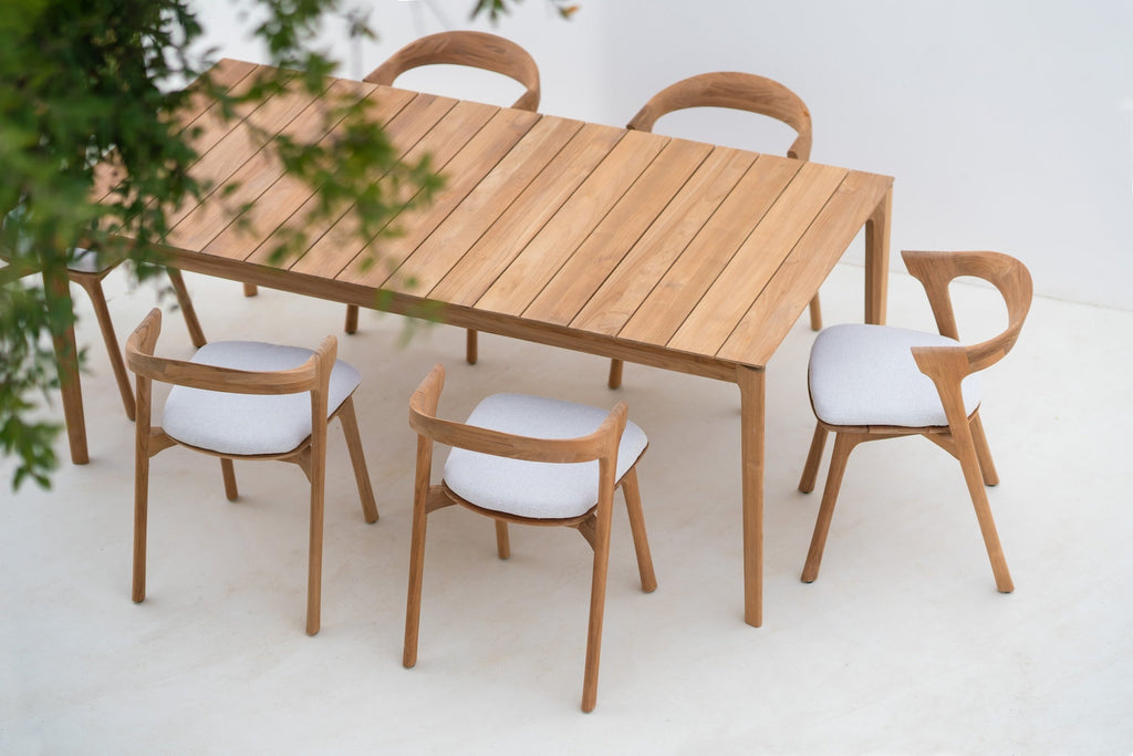 Bok Outdoor Dining Table teak wood with sculptural, airy design and slatted tabletop