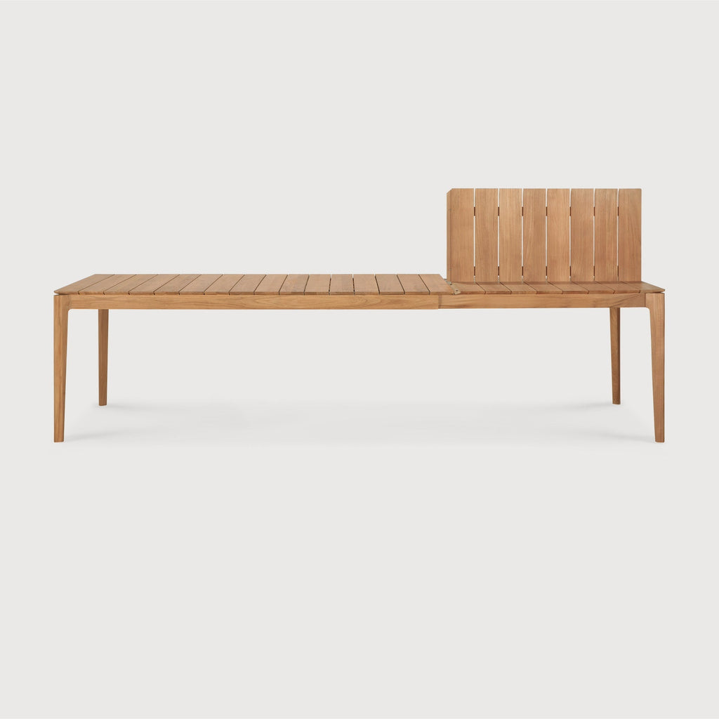 Bok Outdoor Extendable Dining Table in teak with slatted top, extended for 12 seats in modern outdoor setting