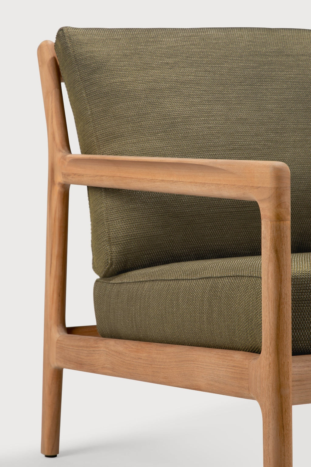 Jack Outdoor Lounge Chair in solid teak with curved, timeless design for outdoor relaxation