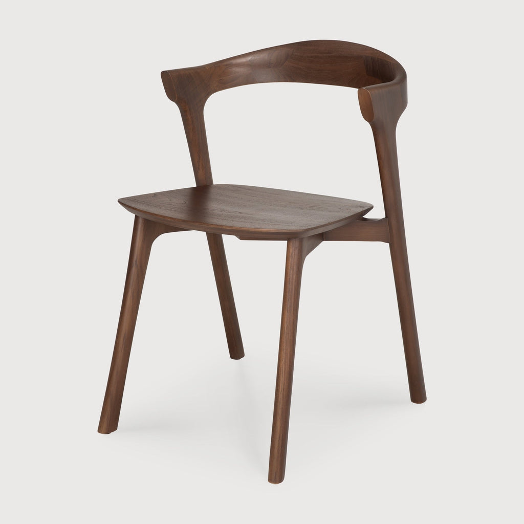 Bok Dining Chair in dark teak with contoured frame and brown varnished finish