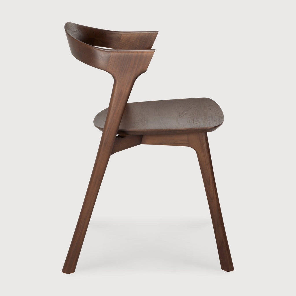 Bok Dining Chair in dark teak with contoured frame and brown varnished finish