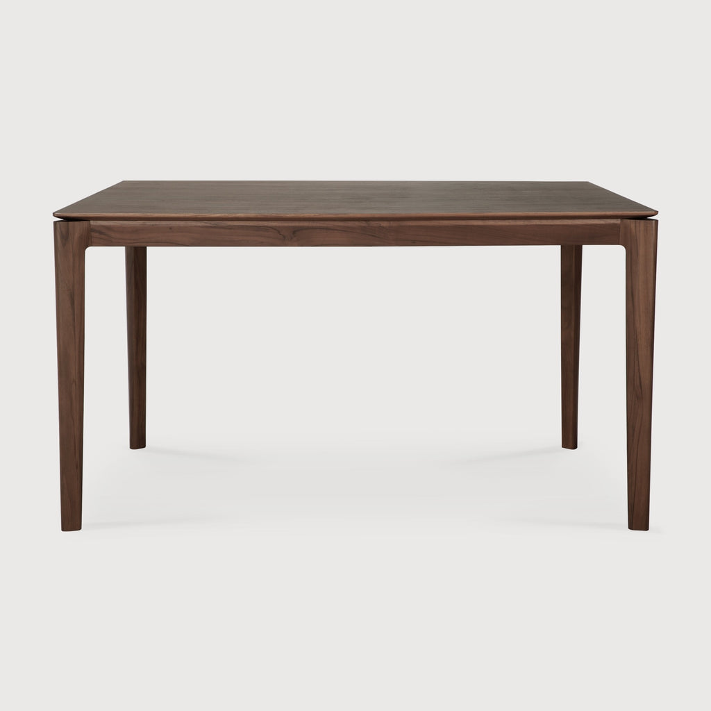 Small Darkened Teak Bok Dining Table side view with white background, featuring floating table top and beautiful wood joinery. - Saffron and Poe, Ethnicraft