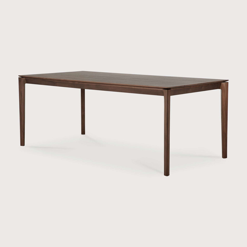 Dark teak Bok Dining Table with floating top and contoured frame made from solid natural teak