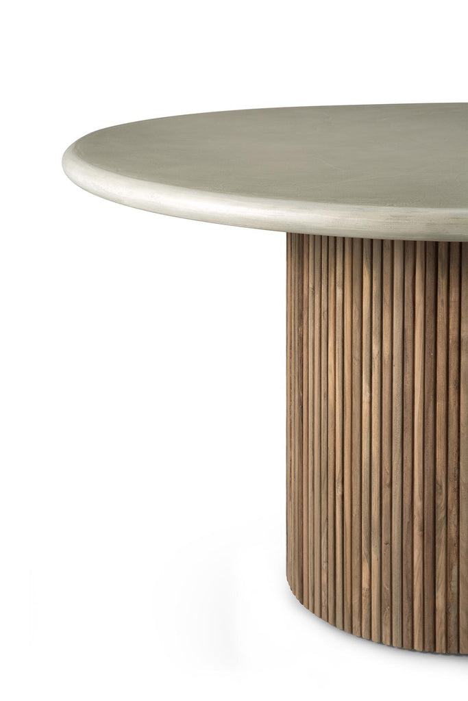 Detail view of round outdoor table with slatted reclaimed teak base and concrete table top. - Saffron and Poe, Ethnicraft
