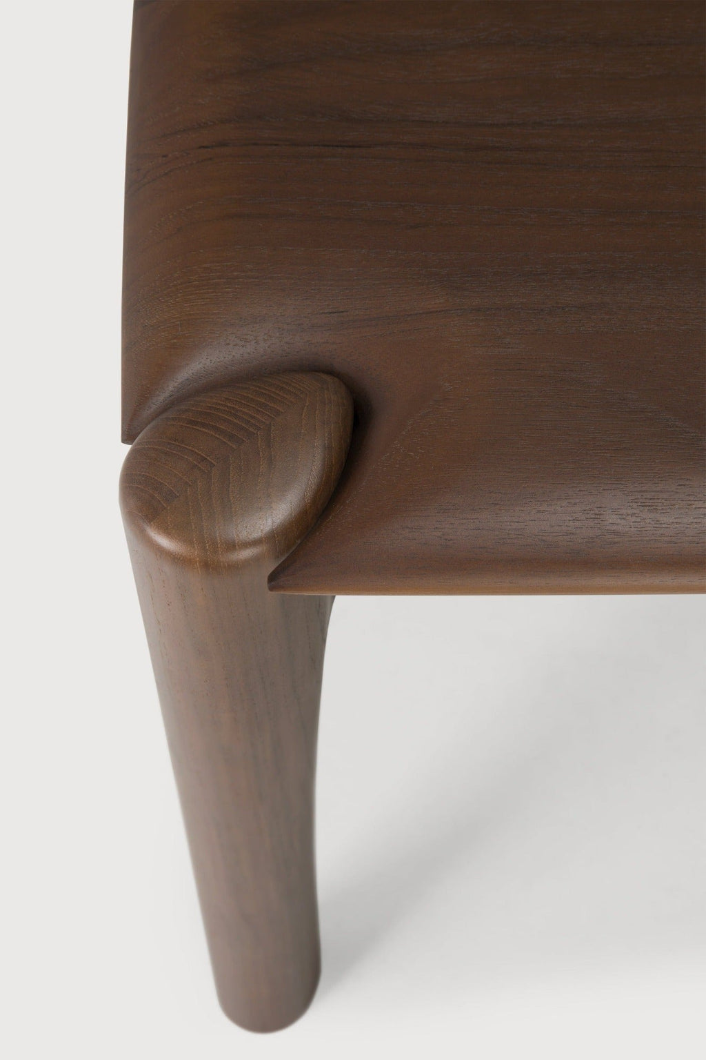PI Bench in dark teak with modern silhouette and curved edges, handcrafted solid teak wood