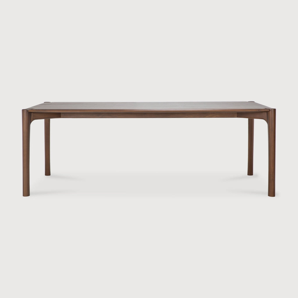 PI Dining Table in dark teak with sculpted base and curved edges, handcrafted from solid natural teak