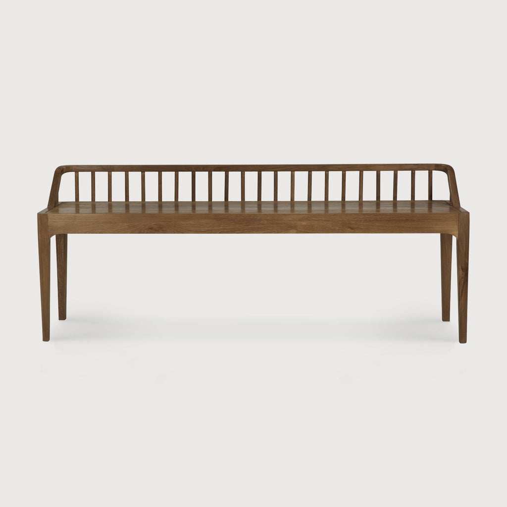Dark teak spindle bench with low spoked back and spacious seat in coastal modern style