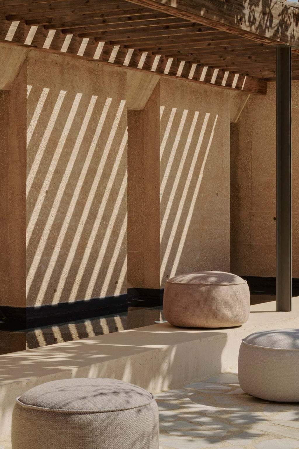 Donut Outdoor Pouf with check fabric and weather-proof design for indoor and outdoor use