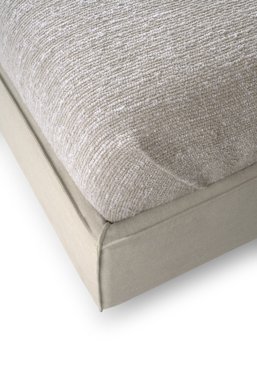 Revive Bed in sand linen upholstery with cushioned headboard and stitched seams for luxury and comfort