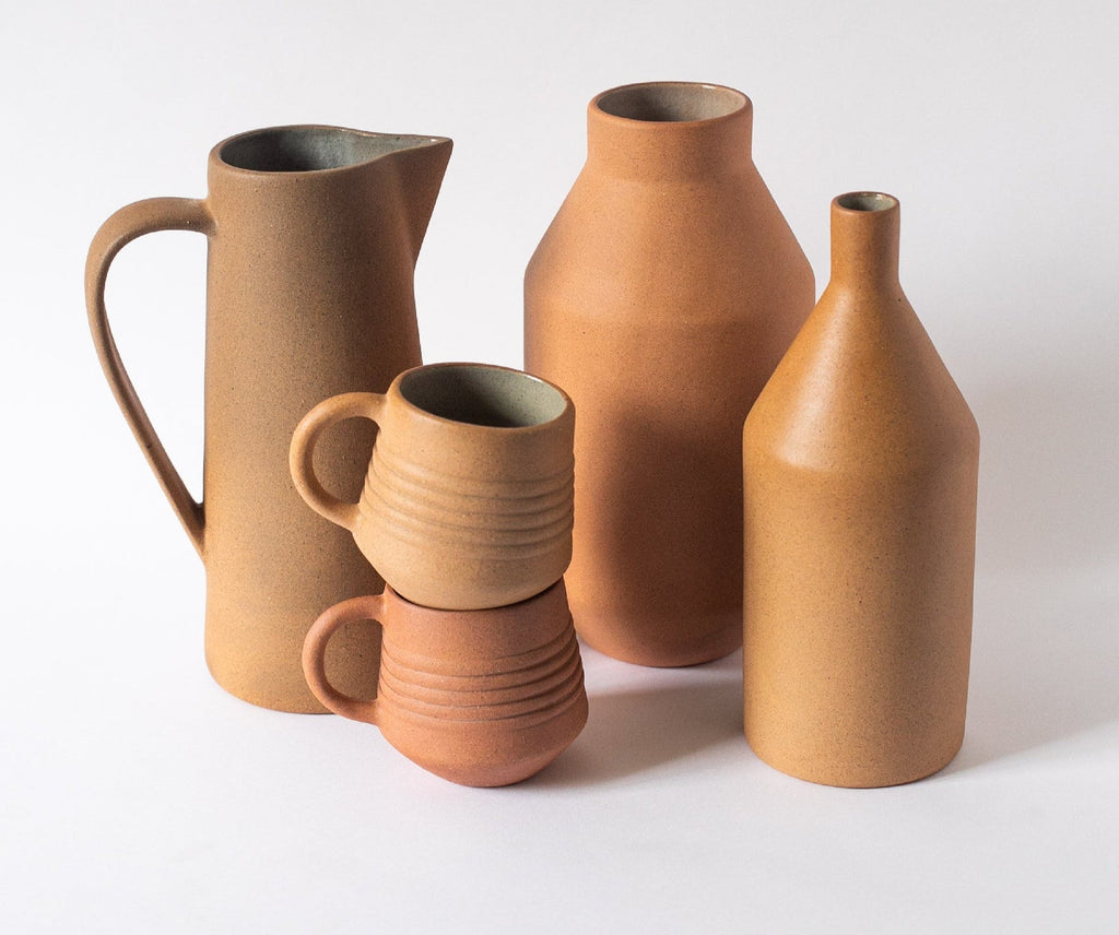 Handcrafted 10 oz Bola Cup ceramic glass with natural earth tones and kiln-fired texture
