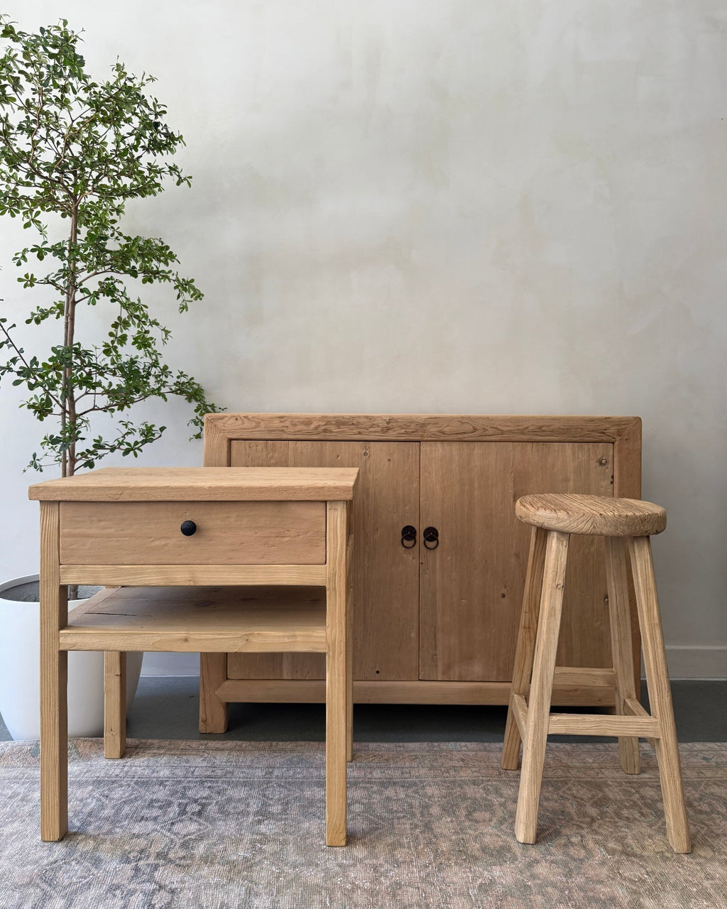 Handmade vintage cypress cabinet with natural finish and two doors showcasing reclaimed wood craftsmanship