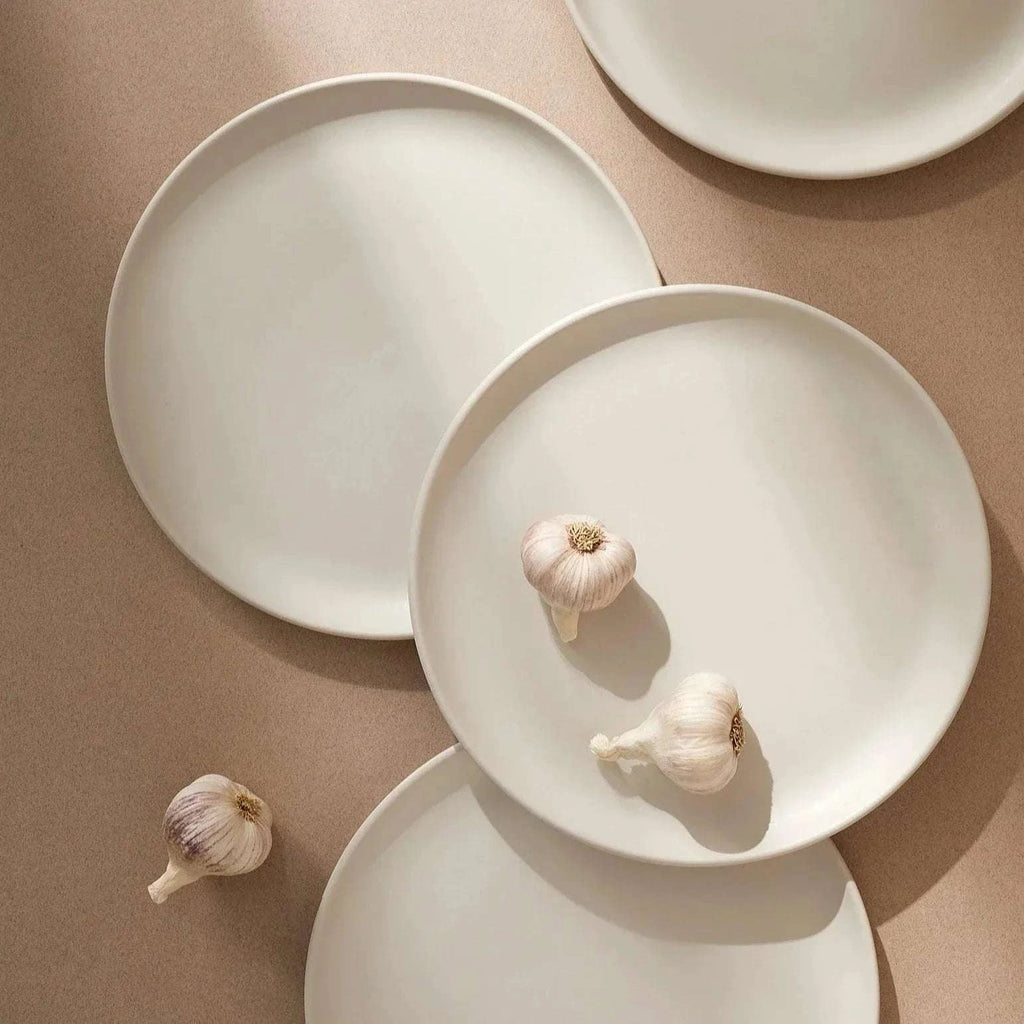 Tunisian 12pc dinnerware set with handmade stoneware dinner plates, side plates, and bowls in neutral tones