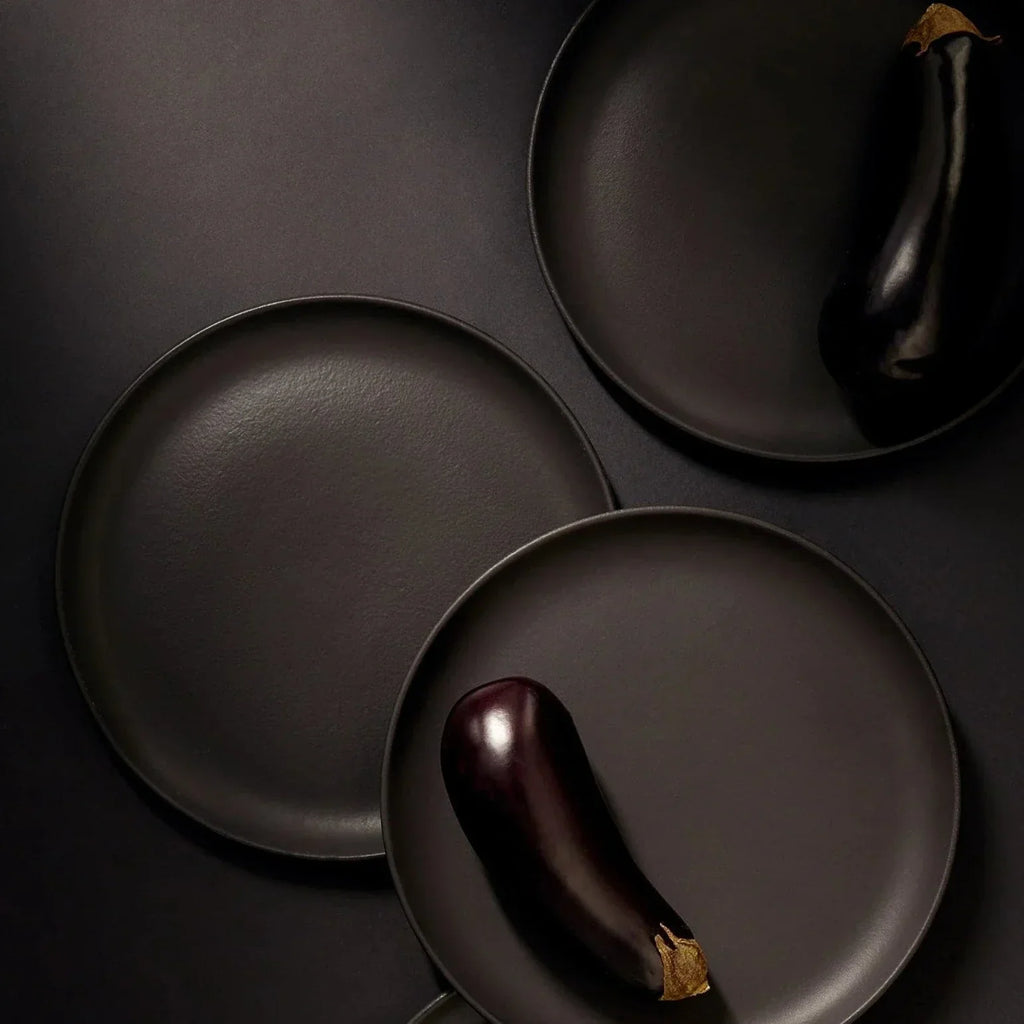 Tunisian 12pc matte black dinnerware set including handmade stoneware dinner plate, side plate, and bowl