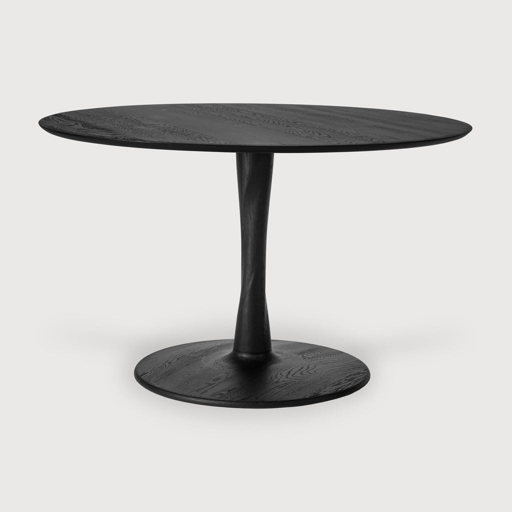 Black oak Torsion Dining Table with round top and twisted sculptural base