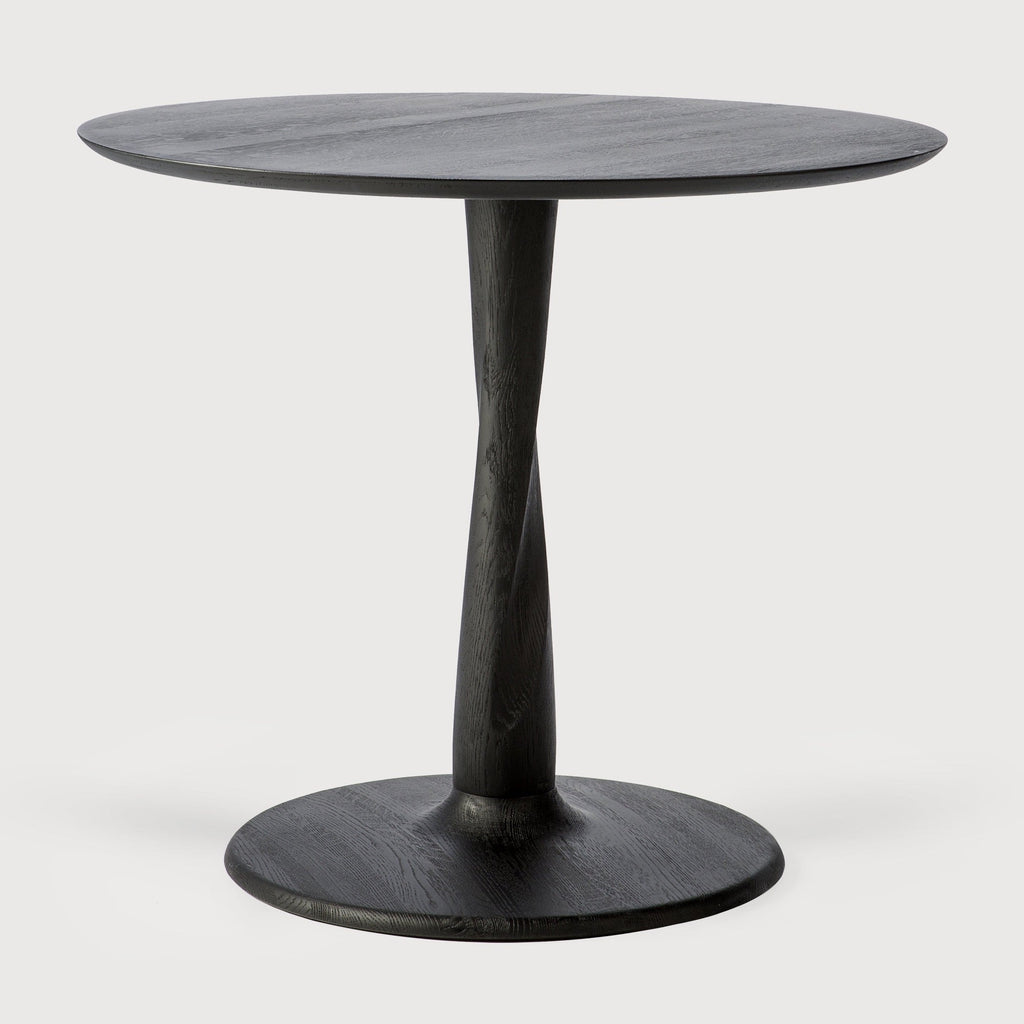 Black oak Torsion Dining Table with round top and twisted sculptural base